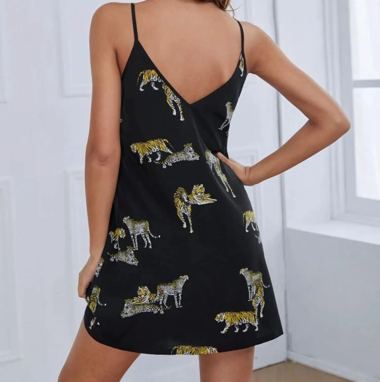 Double v-neck leopard and tiger print dress