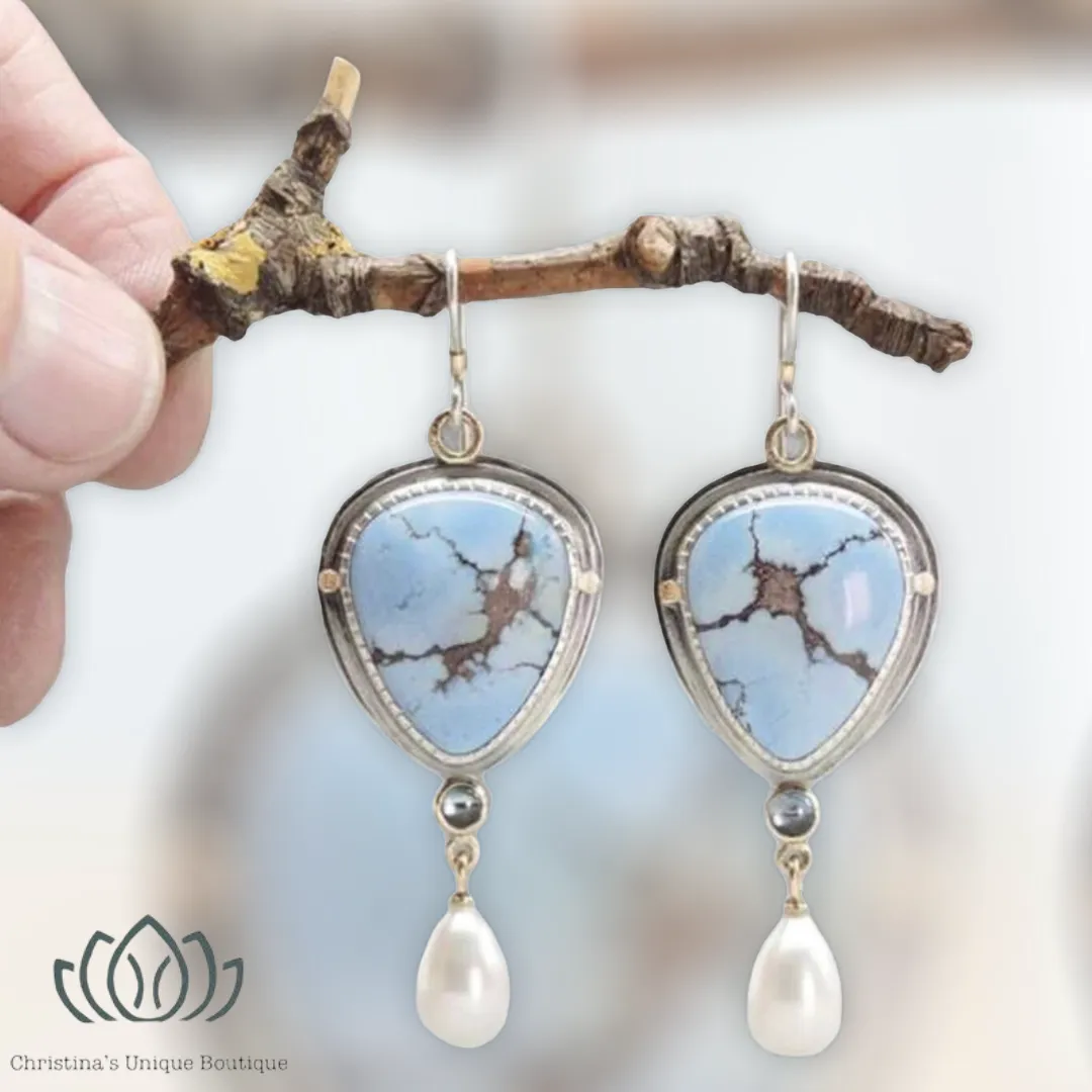 Light blue stone and Pearl feminine dangle earrings.
