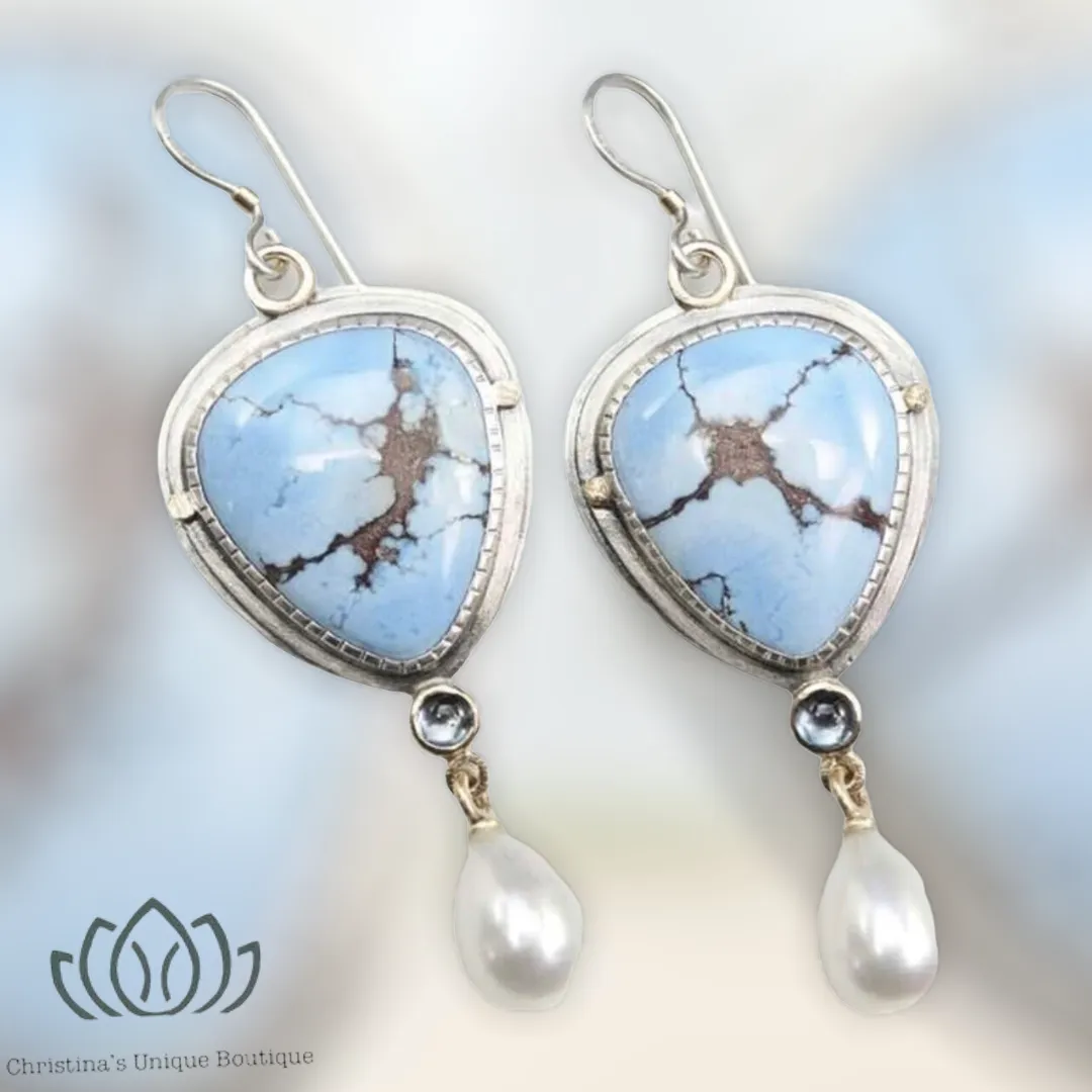 Light blue stone and Pearl feminine dangle earrings.