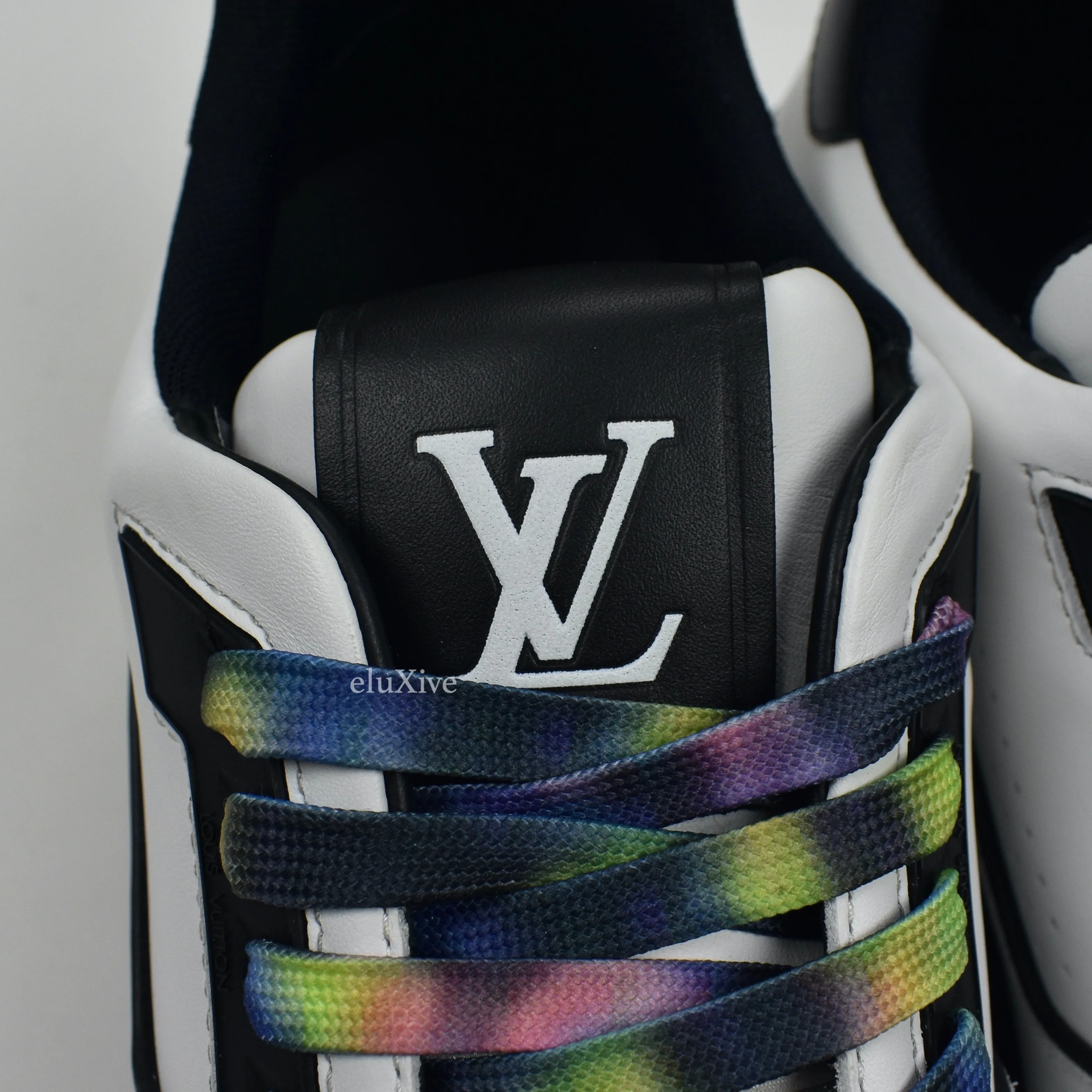 Louis Vuitton - White / Black Leather Trainer Sneakers