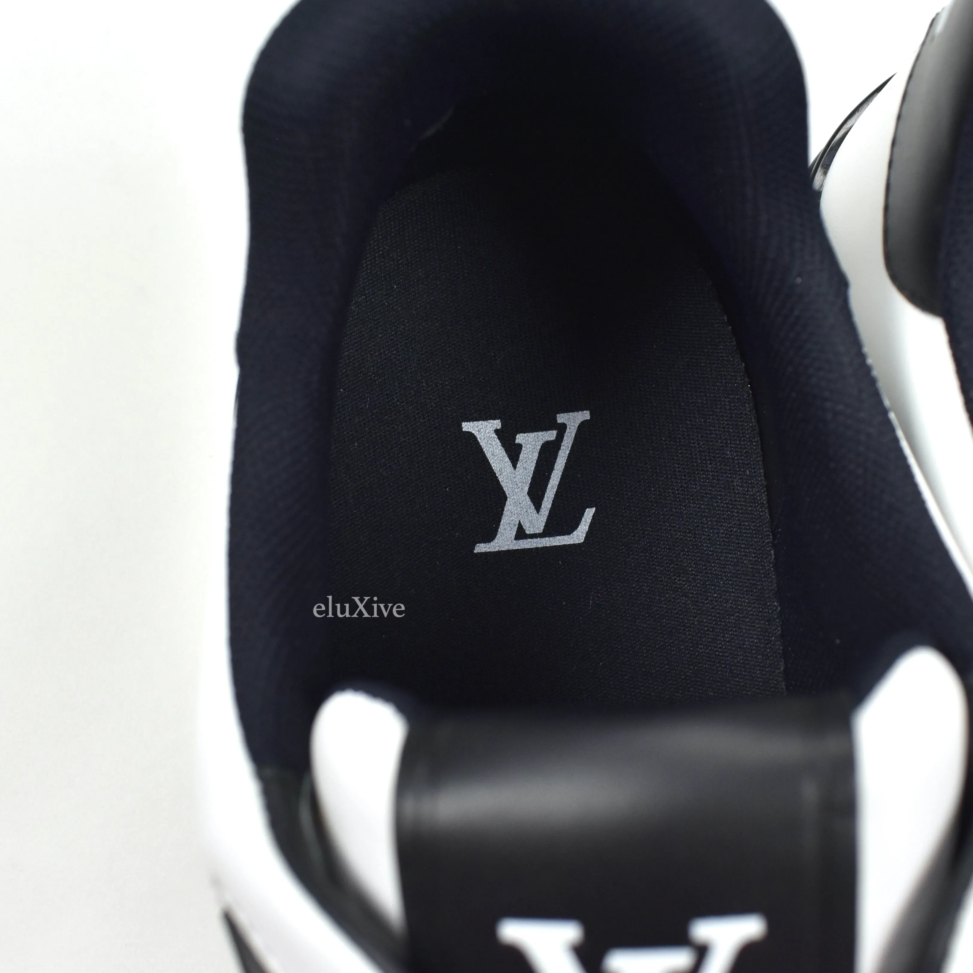 Louis Vuitton - White / Black Leather Trainer Sneakers