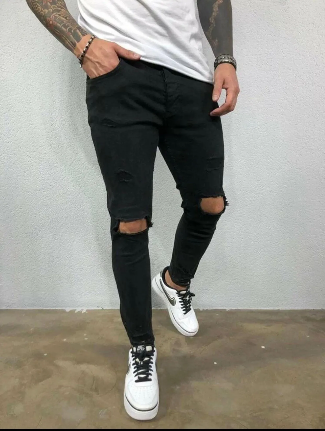Men’s black ripped detail skinny jeans