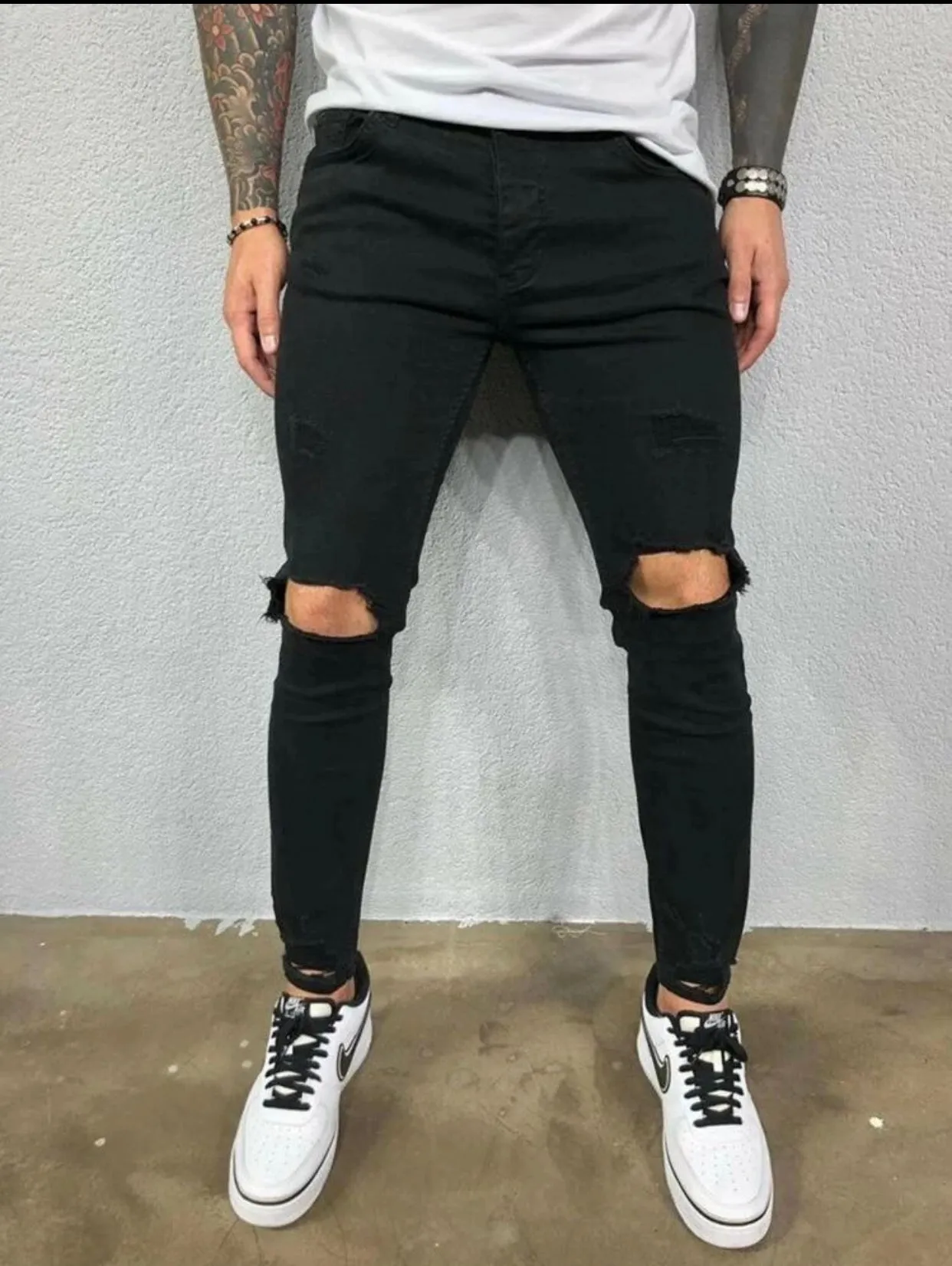 Men’s black ripped detail skinny jeans