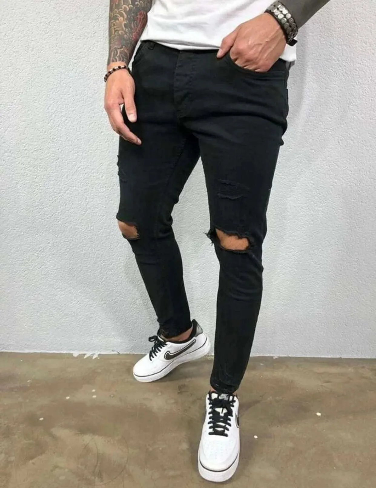 Men’s black ripped detail skinny jeans