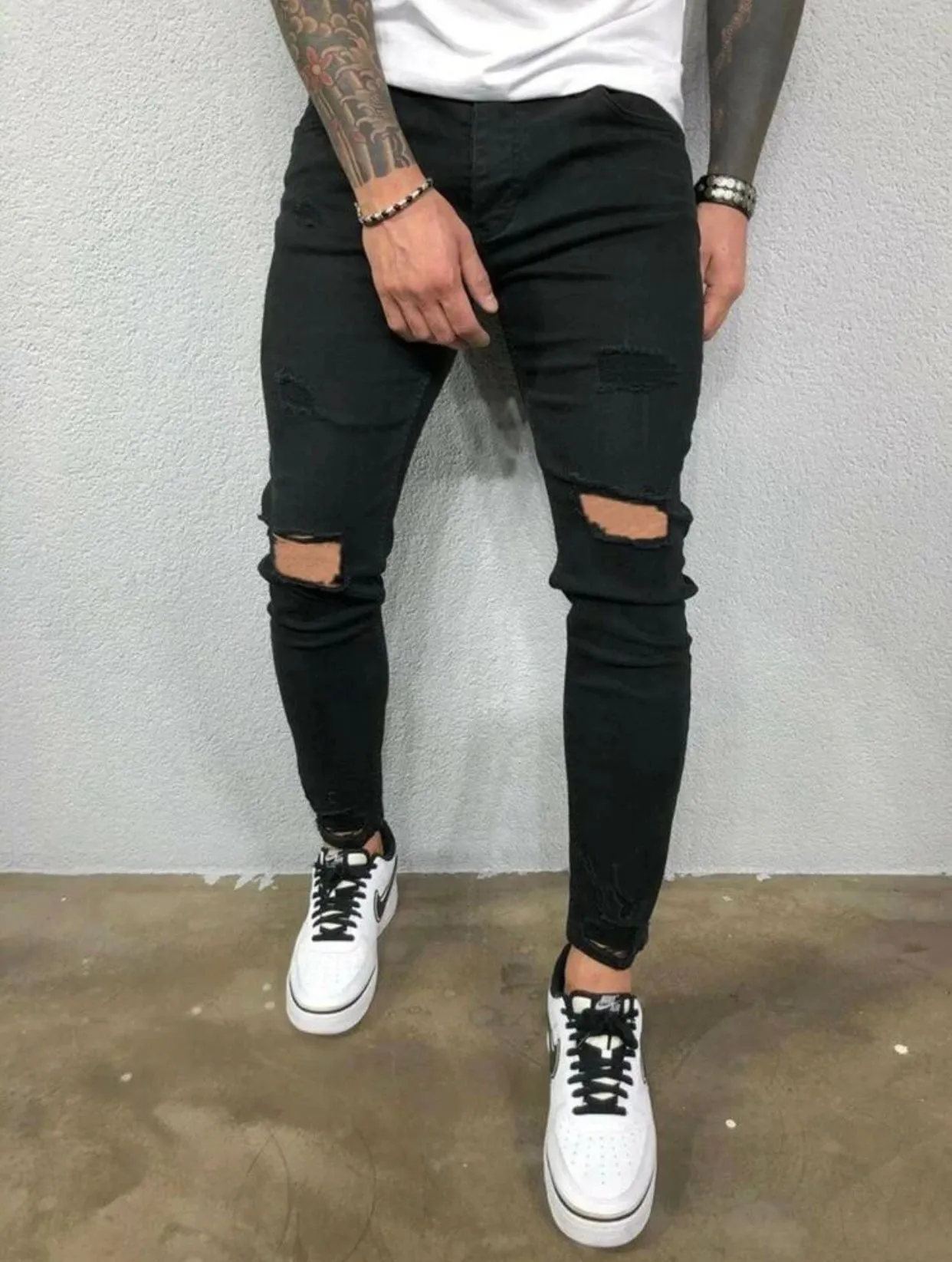 Men’s black ripped detail skinny jeans
