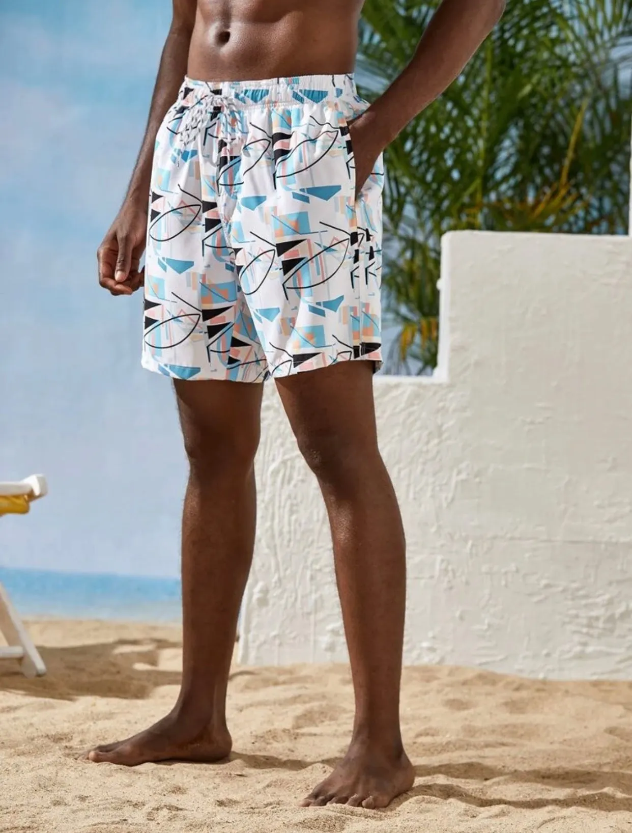 Men’s geo print drawstring waist swim trunks