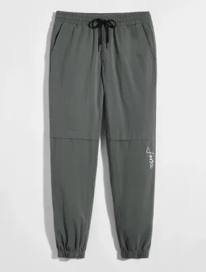 Men’s graphic drawstring waist pants