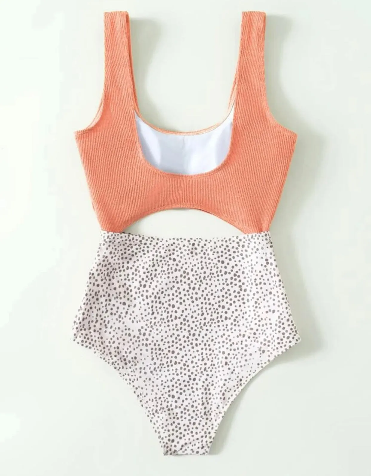 Peach colored Dalmatian cut out one piece swimsuit