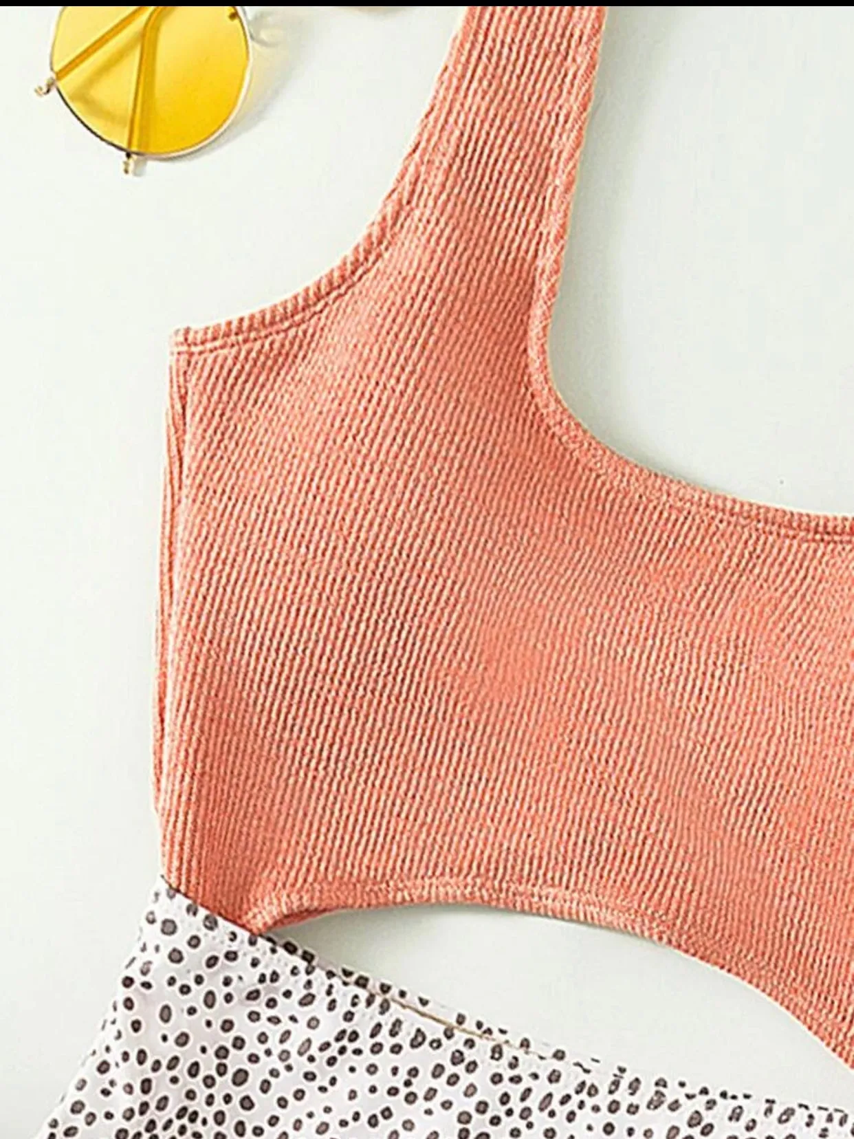 Peach colored Dalmatian cut out one piece swimsuit