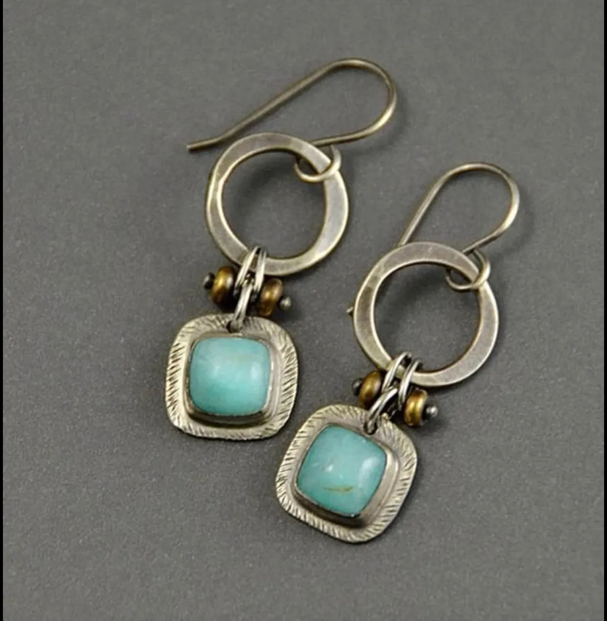 Round decor turquoise drop earrings.