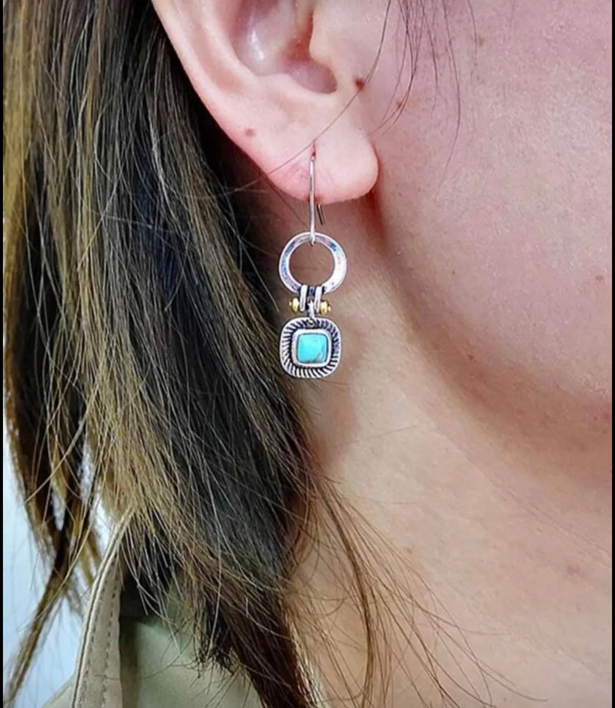 Round decor turquoise drop earrings.